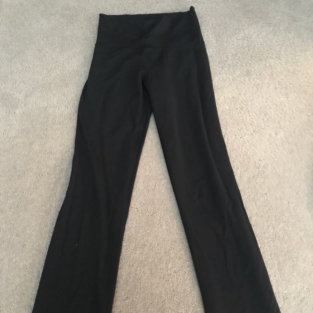 Black flared Lulu Lemon yoga pants